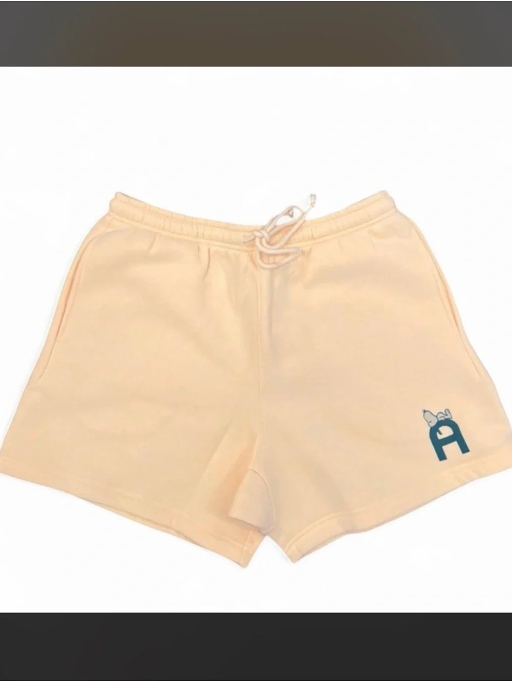 Peanuts Cream Athletic Drawstring Shorts with Blue Logo